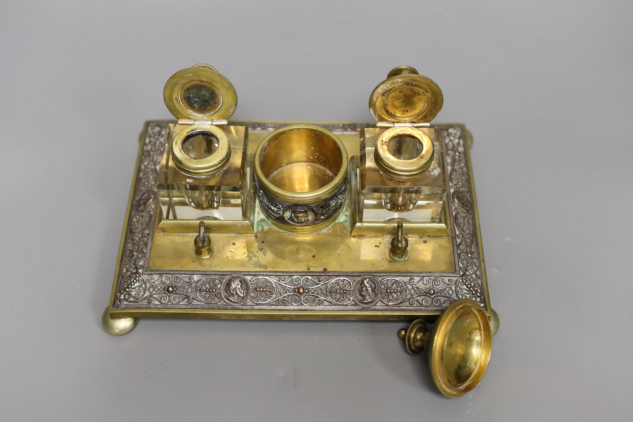 A late 19th century brass inkstand, 24cm wide